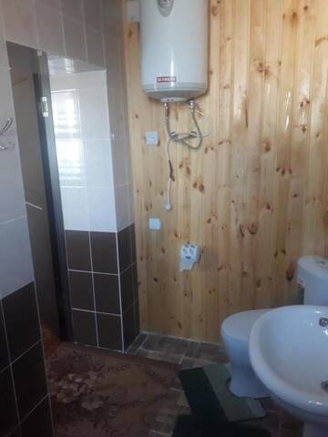Фото номера Двухместный номер Делюкс с 1 кроватью Гостевой дом Guest House KAGAN г. Токтогул 11